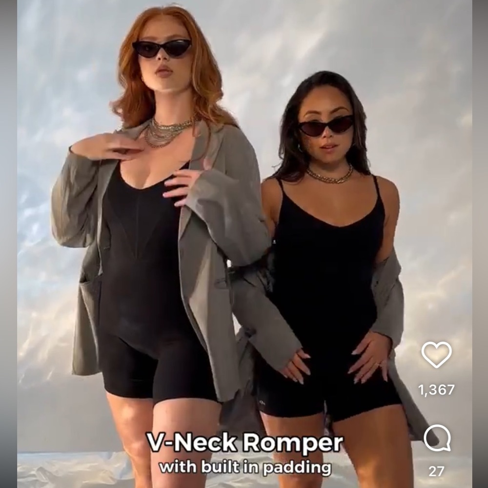 NWT. Size S, black v neck romper. Braless. Klassy Network
